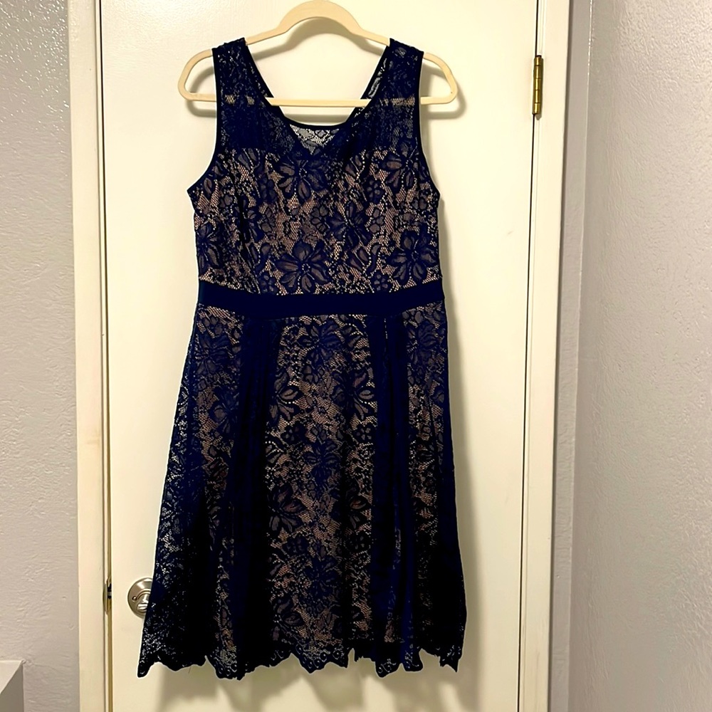 Size large Candalite dress with a nude underlay and navy blue lace overlay.